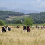 Migranti in corsa verso Gevgelija, Macedonia (©REUTERS/Ognen Teofilovski)
