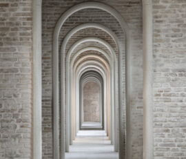Enfilade di archi negli spazi di The Human Safety net. ph Alessandra Chemollo