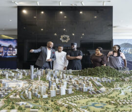 Centenary City Sales Office in Abuja, Nigeria. Centenary City is a planned new city near Abuja International Airport within the Federal Capital Territory. CC will be an exclusive, luxury and fenced compound of 1300 acres, modeled on Dubai. The masterplan was initiated in 2014 by former president Goodluck Jonathan and designed by Emirati real estate tycoon Mohamed Al-Abbar. The city will be an economical free zone to attract investors. It will have the tallest tower of Africa, a giant shopping mall and a 5 star hotel, an urban safari park, a theme park, upscale residential blocks and villas, a state of the art hospital, schools, a commercial hub and a diplomatic zone. The inauguration for CC is scheduled for 2023.